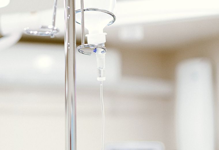 Intravenous drip stand in a hospital ward
